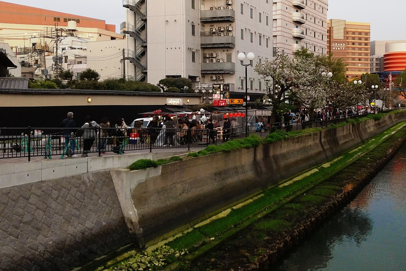 A row of yatai, the open-air street food stalls, along the Naka river at Nakasu.